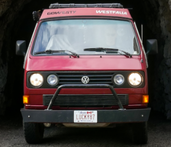 Pictured: front view of a red Westfalia van