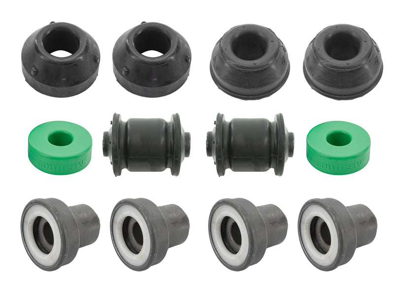 Collection of front suspension bushings on white background 