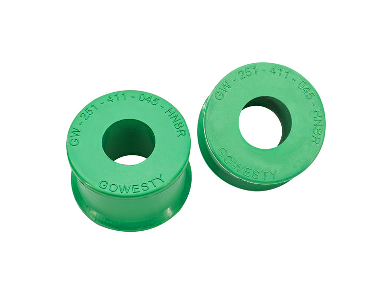 Two 19 sway bar link to bar durogreen bushings on white background