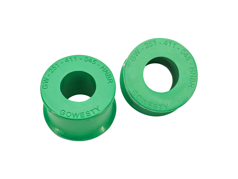 Two 21 sway bar link to bar durogreen bushings on white background