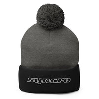 Thumbnail of Syncro Script Pom-Pom Beanie